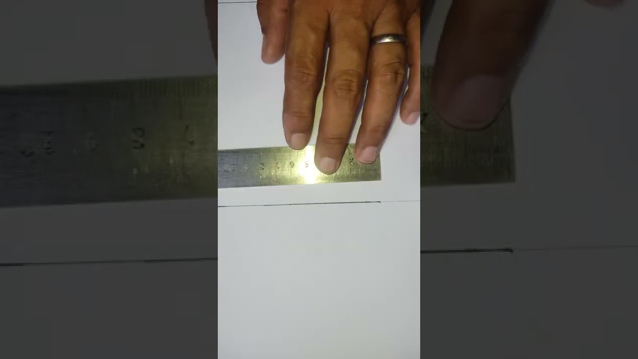 Trazado de una línea perpendicular en el punto medio de un segmento recto